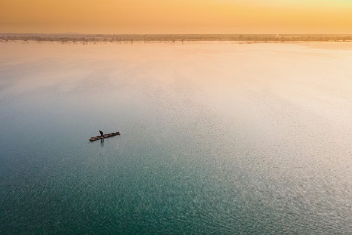 Canoe on the lake at sunset